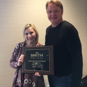 Erin MacDonald-Birnbaum Receiving Career Achievement Award from CEO Dan Smith, April 9, 2016