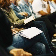 An author promoting their book at a book club. Super-fan followings can help improve your book sales, authors need to join a book club.