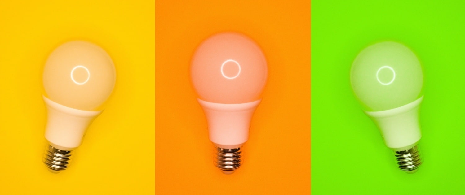3 different colored light bulbs represent ideas on how to market your book.