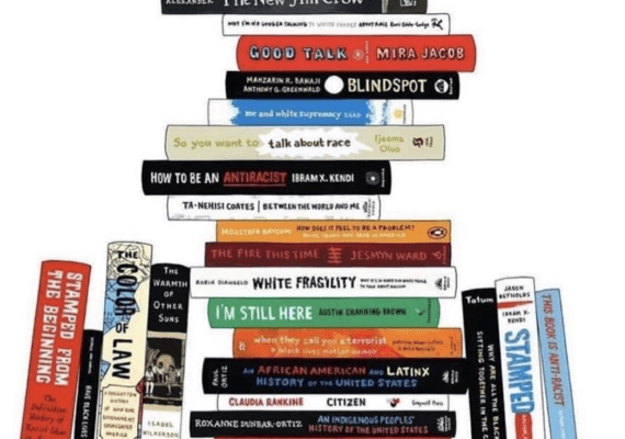 12 Ways to Spark Book Sales and Maximize a PR Campaign. A pile of books that were marketed by Smith Publicity.