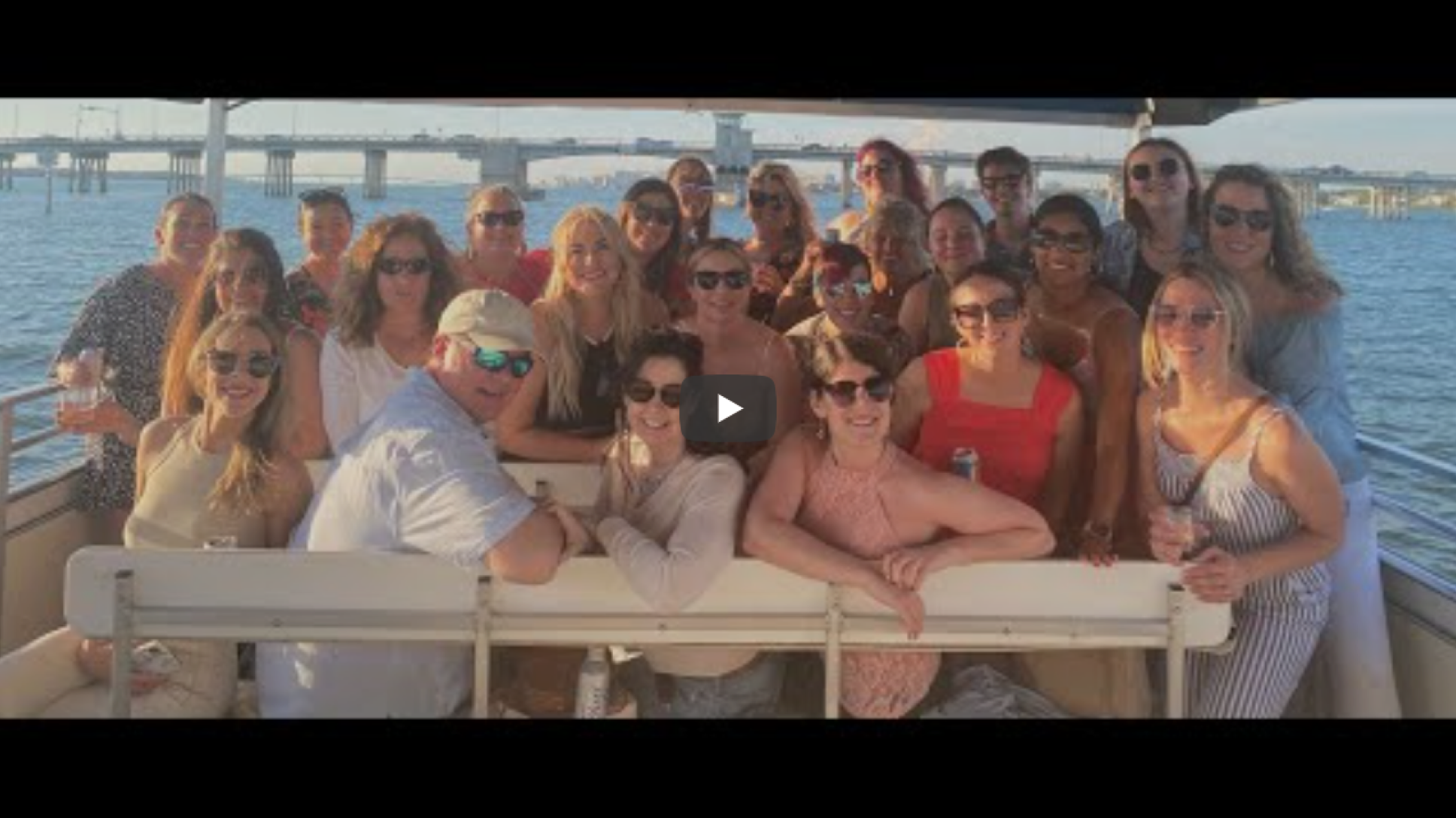 Smith Publicity team aboard a boat — Our Story video
